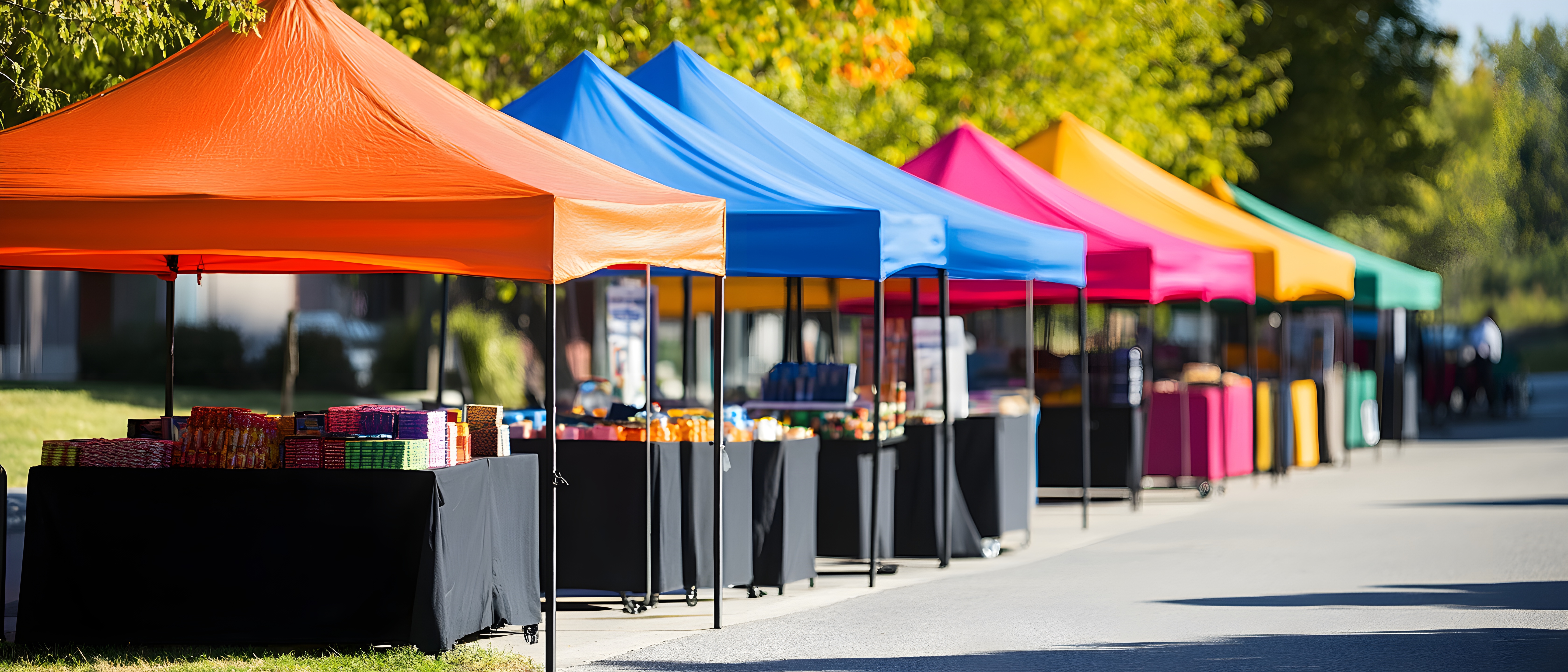 Custom branded pop up tents at an outdoor event